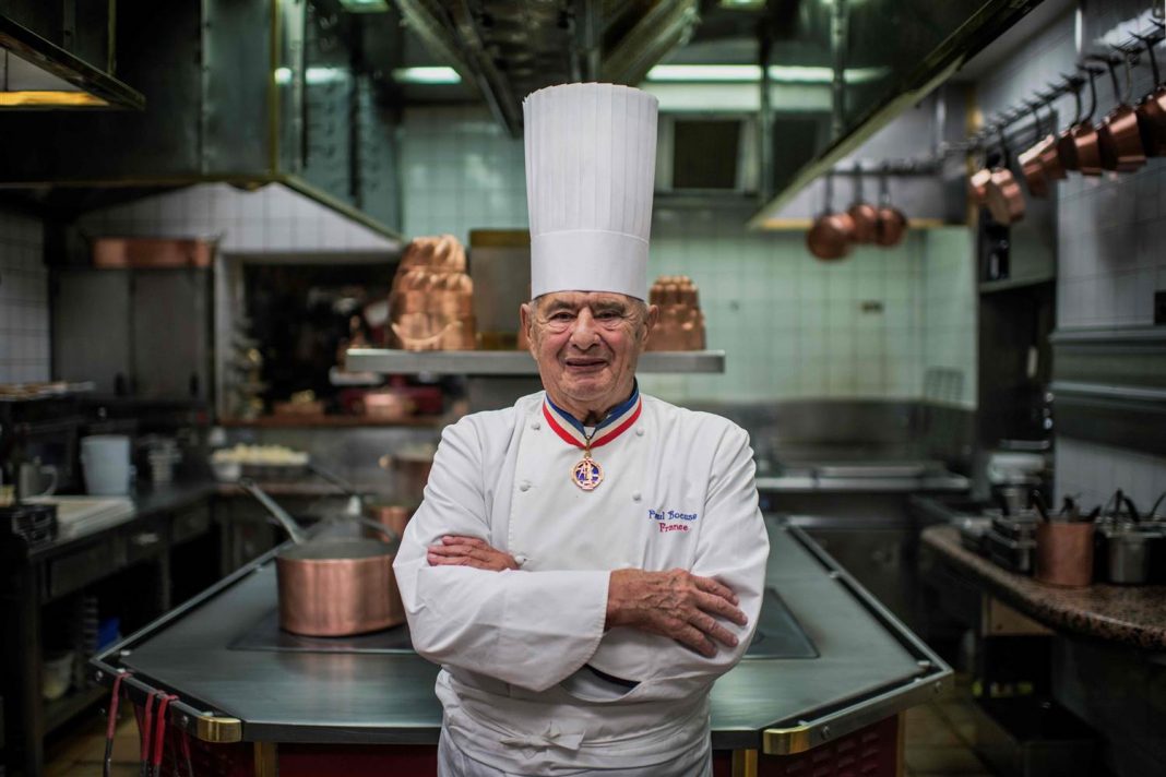 French chef Paul Bocuse poses in his kitchen at L'Auberge de Pont de Collonges, during a culinary work shop in Collonges-au-Mont-d'Or on Nov. 9, 2012.