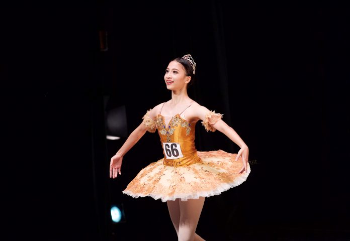 A talented young dancer taking part in RAD Genée International Ballet Competition